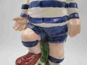 Football player wind-up musical bottle. Melody & movement. Polychrome ceramic