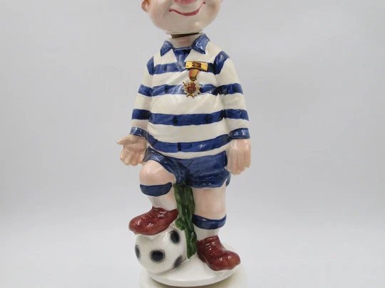 Football player wind-up musical bottle. Melody & movement. Polychrome ceramic