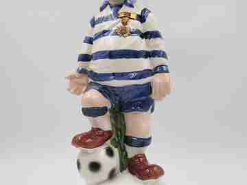 Football player wind-up musical bottle. Melody & movement. Polychrome ceramic