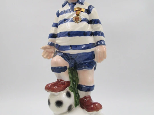 Football player wind-up musical bottle. Melody & movement. Polychrome ceramic