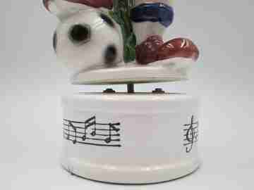 Football player wind-up musical bottle. Melody & movement. Polychrome ceramic