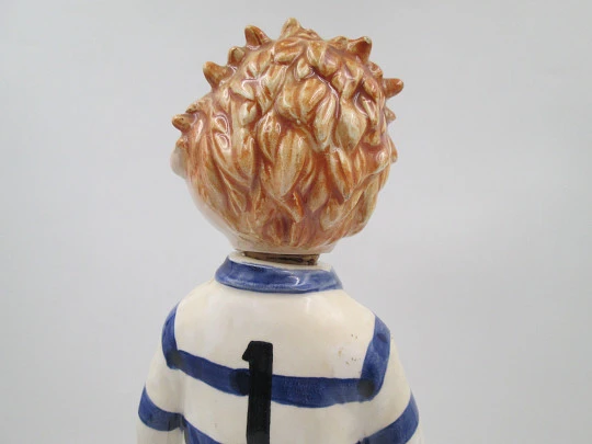 Football player wind-up musical bottle. Melody & movement. Polychrome ceramic