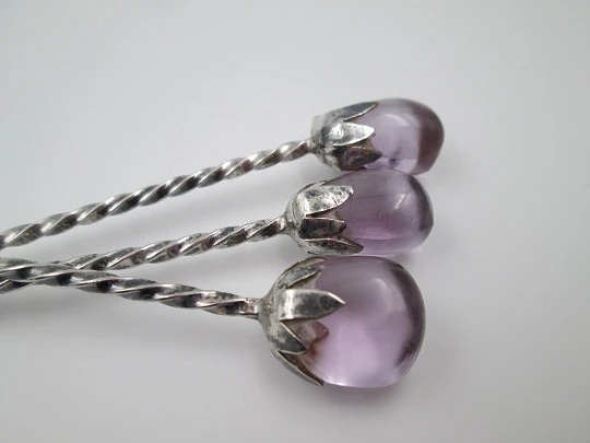 Four cocktail mixing spoons. 900 sterling silver and amethyst crystals. Chile. 1980's