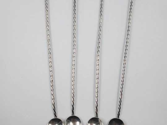 Four cocktail mixing spoons. 900 sterling silver and amethyst crystals. Chile. 1980's