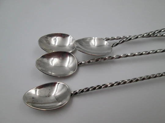 Four cocktail mixing spoons. 900 sterling silver and amethyst crystals. Chile. 1980's