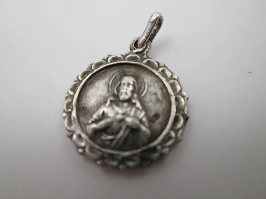Four religious medals. Sterling silver. Virgin, Christ and Saints. 1960's Four religious medals. Sterling silver. Virgin, Christ and Saints. 1960's