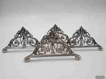 Four table place card holders. Silver plated. 1940's. UK. Openwork