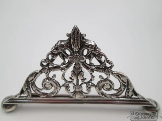 Four table place card holders. Silver plated. 1940's. UK. Openwork