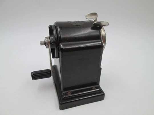 FTE Office Pencil Sharpener. Circa 1950s. Mottled black bakelite