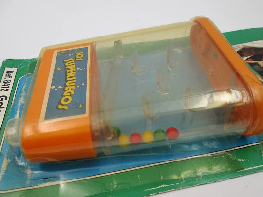 Galaxy portable balls water game. The Supergames. Papirots. Colored plastic. 1980's