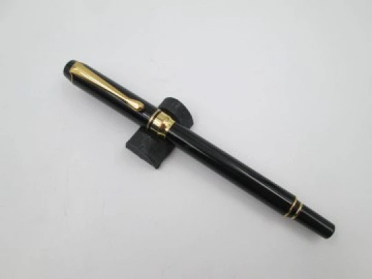 Genius Da Vinci. Black lacquer & gold plated. Converter. Bitone nib. Germany. 2000's