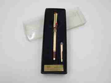 Genius / Peruzzo. Gold plated metal & burgundy resin. Swarovski crystal. Italy. 2000's