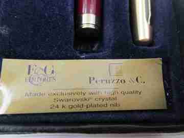 Genius / Peruzzo. Gold plated metal & burgundy resin. Swarovski crystal. Italy. 2000's