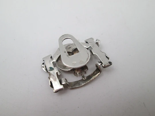 Gentleman openwork lapel emblem. Sterling silver. Royal columnar motif. Spain. 1980's