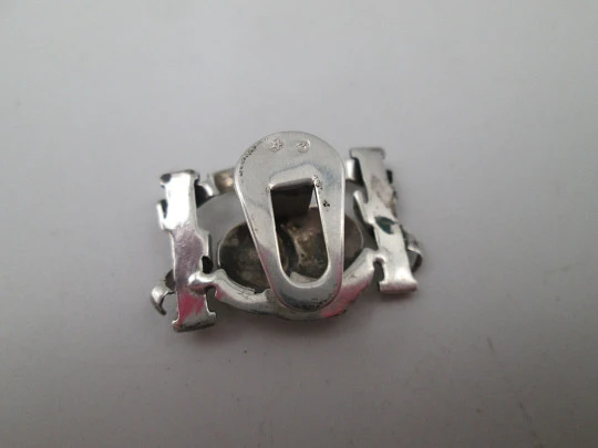 Gentleman openwork lapel emblem. Sterling silver. Royal columnar motif. Spain. 1980's