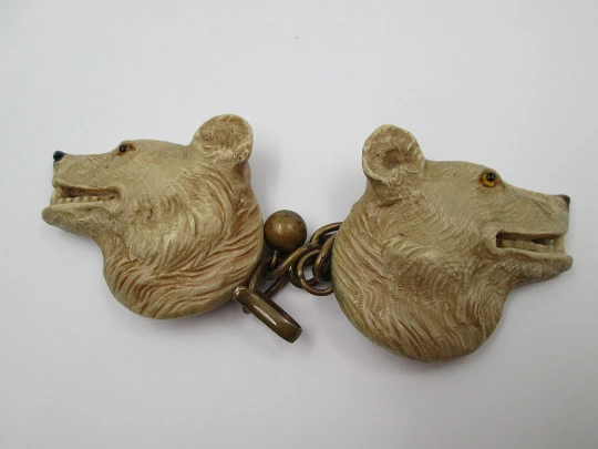 Gentleman's cape / cloak clasp. Grey resin and golden metal. Wolves heads. Europe. 1950's