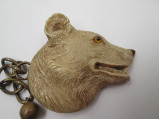 Gentleman's cape / cloak clasp. Grey resin and golden metal. Wolves heads. Europe. 1950's