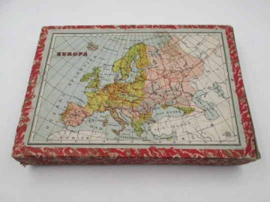 Geographic puzzle cardboard cubes. World map brainteaser. 1950's