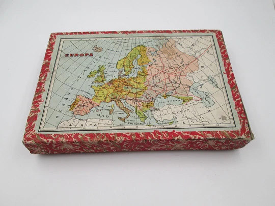 Geographic puzzle cardboard cubes. World map brainteaser. 1950's