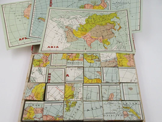 Geographic puzzle cardboard cubes. World map brainteaser. 1950's