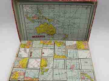 Geographic puzzle cardboard cubes. World map brainteaser. 1950's