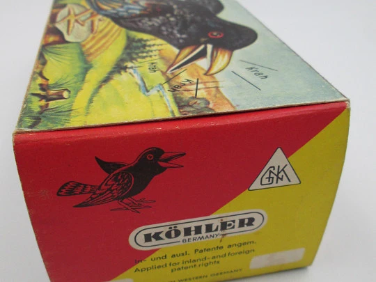 Georg Köhler lithographed tinplate crow. Sound and movement. Original box. Clockwork