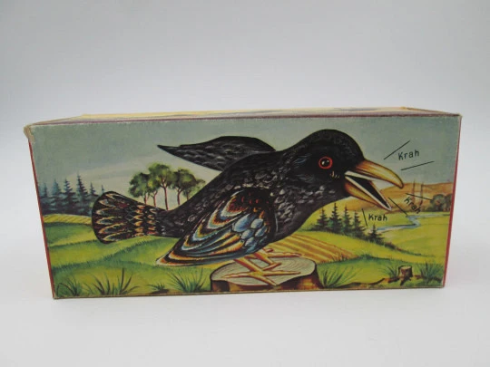 Georg Köhler lithographed tinplate crow. Sound and movement. Original box. Clockwork