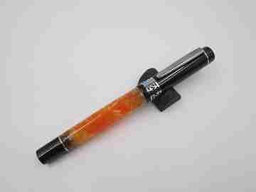 German fountain pen. Orange and black pearl resin. Silver plated details. Golden nib. 2005's