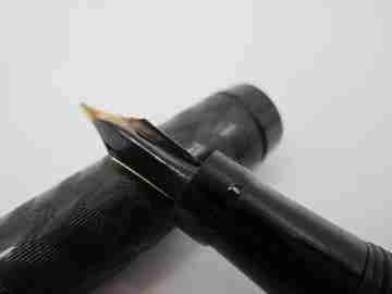 Globe. Chiselled black hard rubber & plated details. 14k gold nib. Lever filler