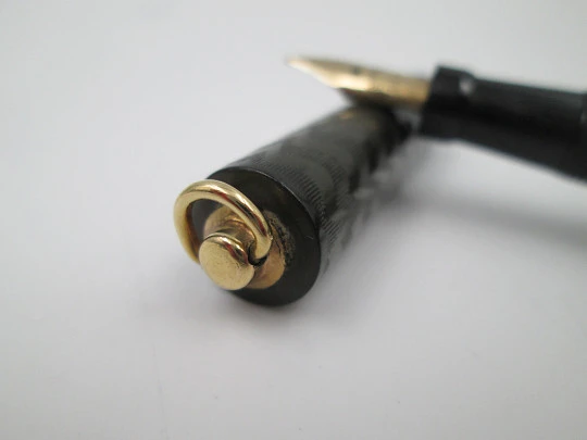 Globe. Chiselled black hard rubber & plated details. 14k gold nib. Lever filler