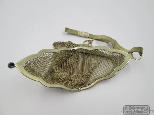 Gold plated mesh vanity bag. 1950's. Blue cabochon. Chain. Tassel