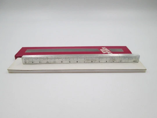 Graduated ruler pocket butane lighter. Silver plated metal. Original box. Europe. 1980's