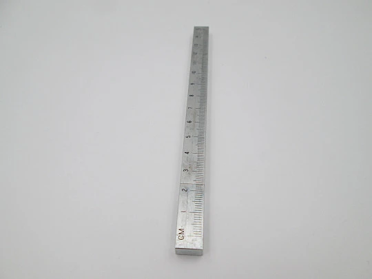 Graduated ruler pocket butane lighter. Silver plated metal. Original box. Europe. 1980's