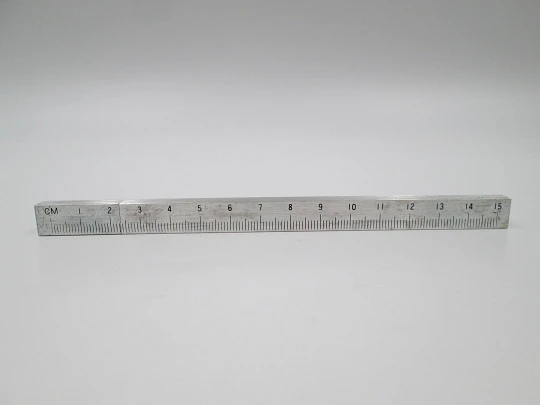 Graduated ruler pocket butane lighter. Silver plated metal. Original box. Europe. 1980's