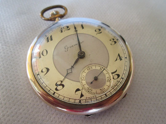 Grosvenor. Gold plated case. Stem-wind. Bi-tone dial. 1930's. Swiss made