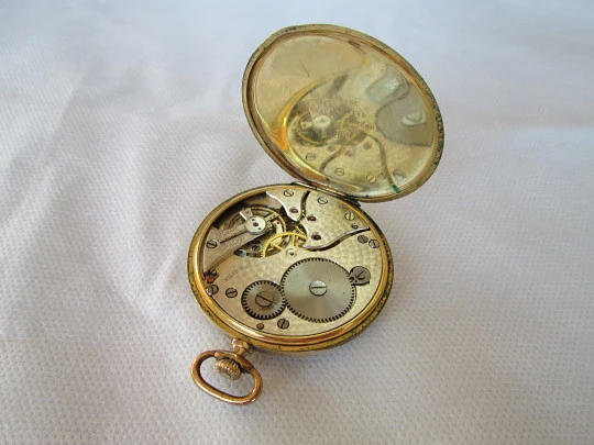 Grosvenor. Gold plated case. Stem-wind. Bi-tone dial. 1930's. Swiss made