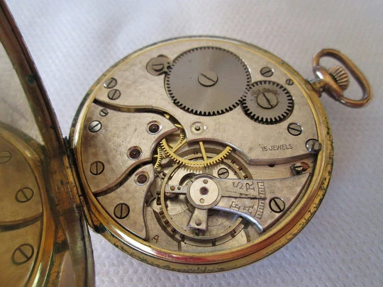 Grosvenor. Gold plated case. Stem-wind. Bi-tone dial. 1930's. Swiss made