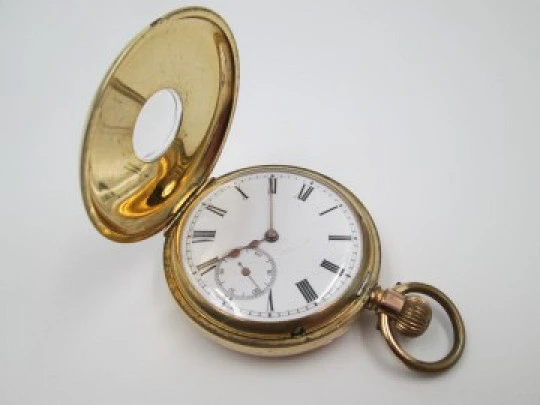 Half / demi-hunter pocket watch. 20 micron gold plated. Swiss. 1910's