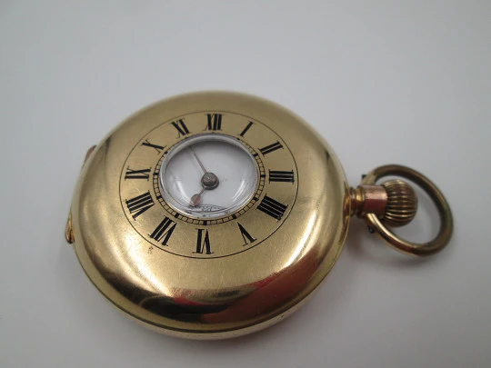 Half / demi-hunter pocket watch. 20 micron gold plated. Swiss. 1910's