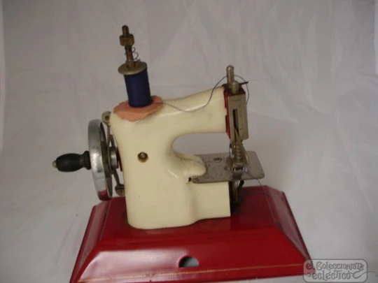 Hand crank sewing machine toy. Little Betty. United Kingdom