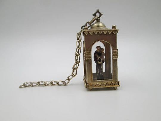 Handcrafted glass-enclosed sterling silver chapel with polychrome Saint Anthony. 1950's