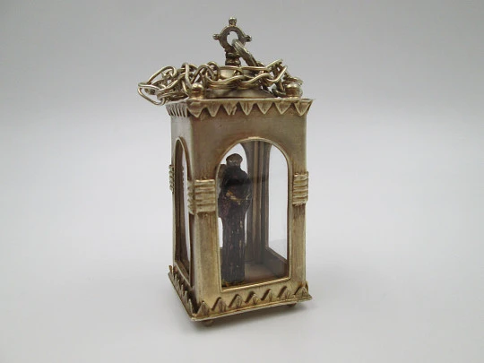 Handcrafted glass-enclosed sterling silver chapel with polychrome Saint Anthony. 1950's