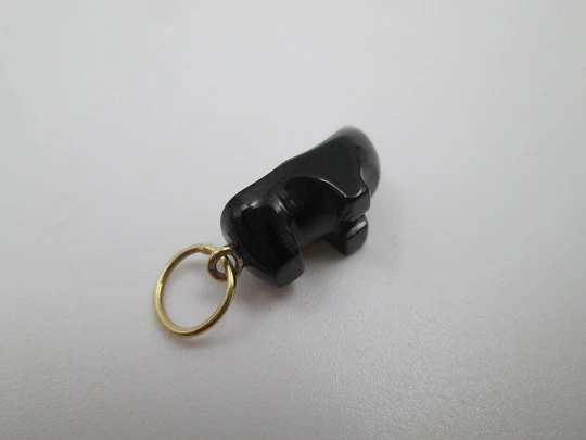 Handmade unisex pendant. Jet clog and 18 karat yellow gold rings. Spain. 1990's
