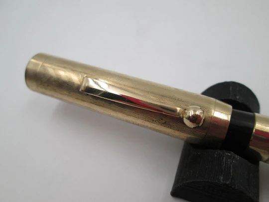 Hard rubber and 14k gold filled fountain pen. Lever filler. Guilloche. 1920's