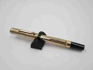 Hard rubber and 14k gold filled fountain pen. Lever filler. Guilloche. 1920's