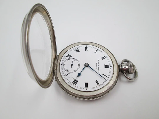 Harris Stone & Dennison. UK / Swiss. Silver. Porcelain dial. Stem-wind