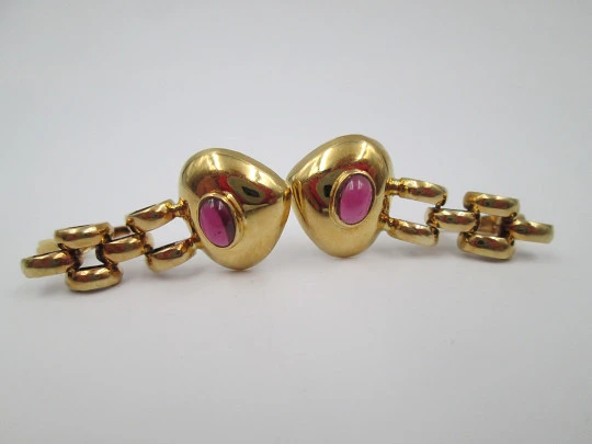 Heart women's earrings. 18 karat yellow gold and rubies. French clasp. Europe