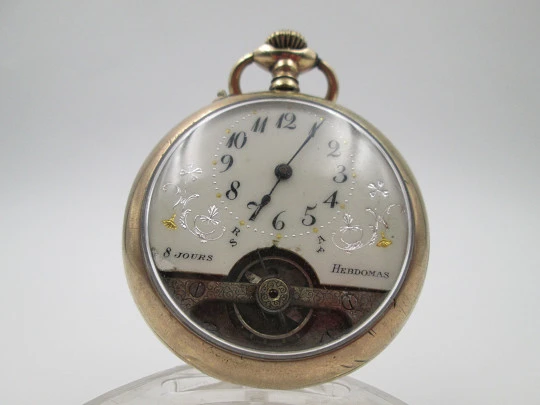 Hebdomas. Gold plated. 8 days stem-wind. Visible escapement. Porcelain dial. 1900's