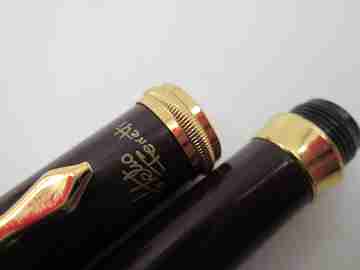 Helio Ferretti. Burgundy lacquer & gold plated details. Cartridge. Bitone nib. 2005's