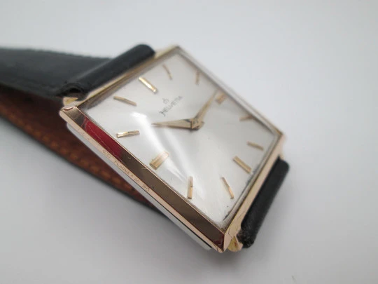 Helvetia. Gold plated & stainless steel. 1950's. Manual wind. Square case